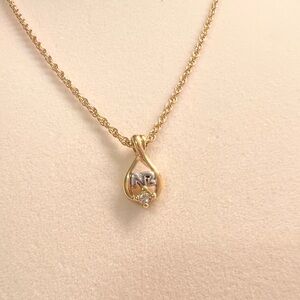 Nina Ricci - Gold and Silver Pendant Necklace